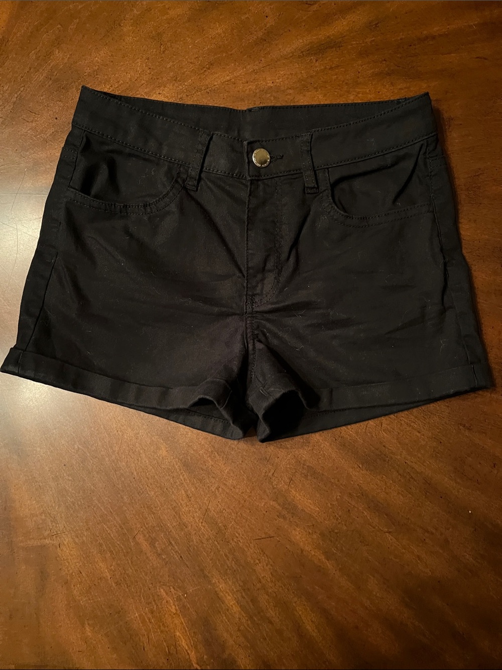 Divided Black Cuffed Jean Shorts